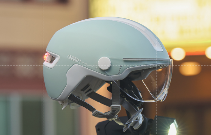 ABUS kerékpáros városi sisak Hud-Y ACE, In-Mold, beépített átlátszó szemüveggel, pure mint, L (57-61 cm)